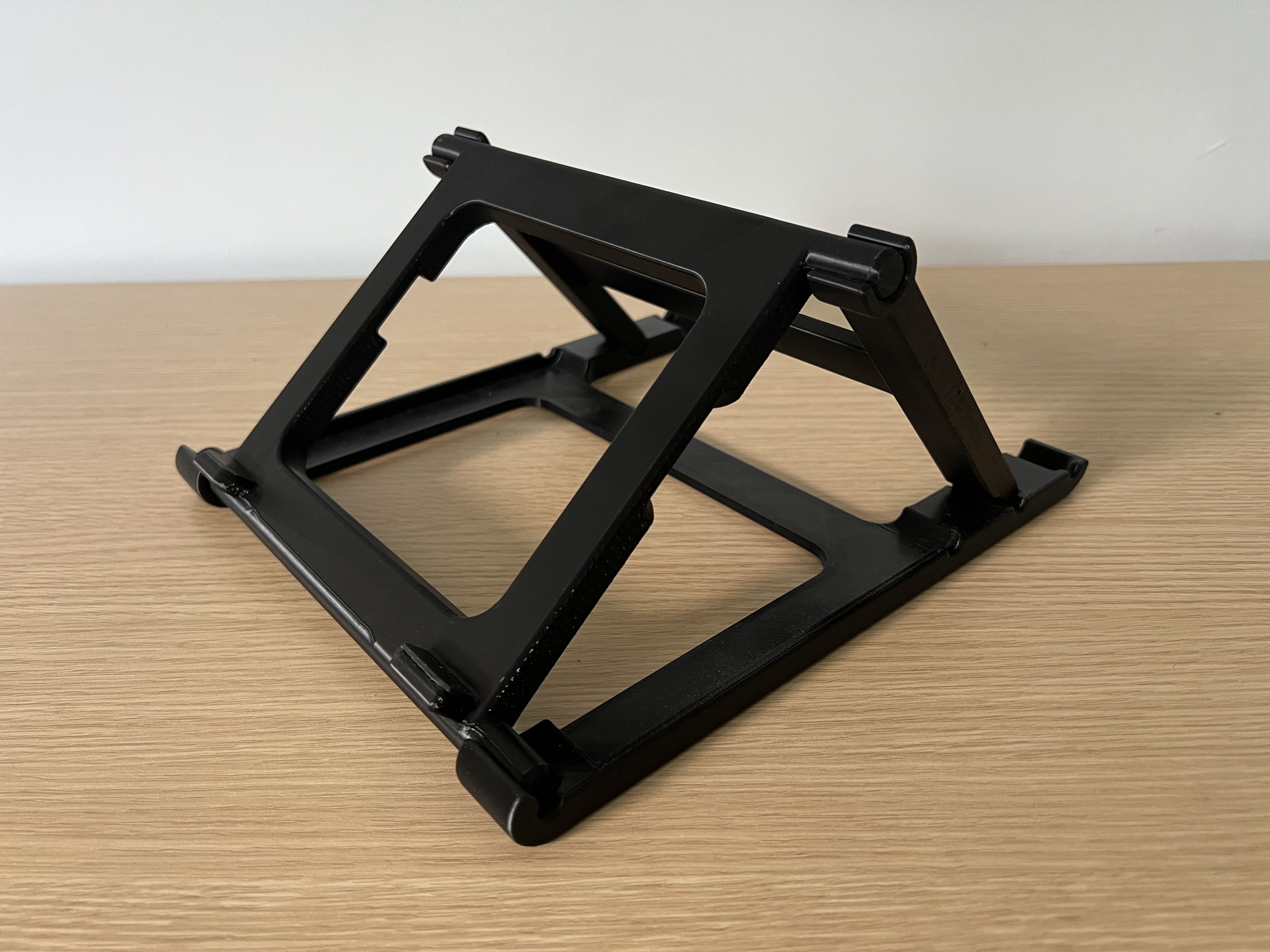 Black folding laptop stand